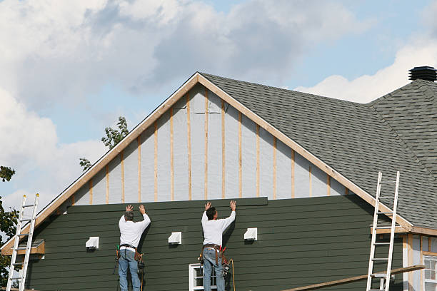 Professional Siding Replacement technician working in Herminie, PA